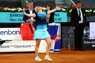 MADRID, SPAIN - MAY 07: Ons Jabeur of Tunisia celebrates victory during the Women's Singles final match against Jessica Pegula of the United States during day ten of Mutua Madrid Open at La Caja Magica on May 07, 2022 in Madrid, Spain. (Photo by Clive Brunskill / Getty Images)