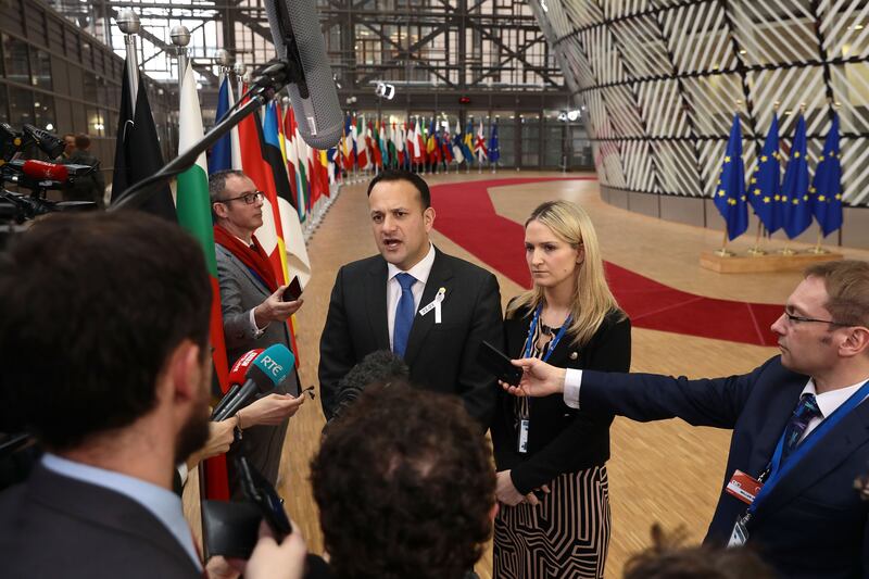 Mr Varadkar speaks to the media as he arrives for a European Council leaders' summit in Brussels in March 2018. Getty Images