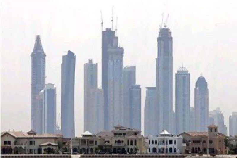The number of property related companies in Dubai has gone down. Jeff Topping / The National
