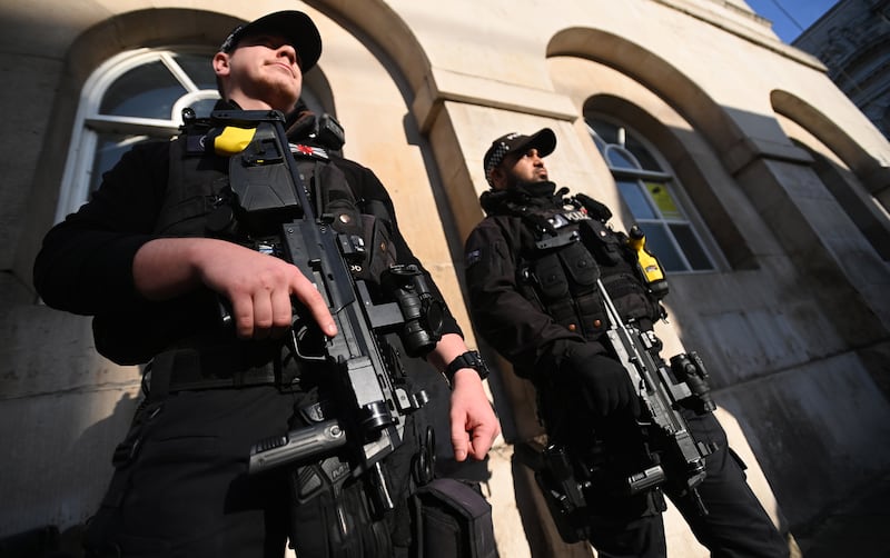 Armed police in central London, Britain, 16 November 2021. EPA