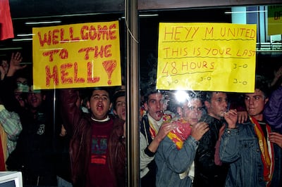 Galatasaray fans welcome Manchester United players and officials to Istanbul at Ataturk Airport in 1993. PA