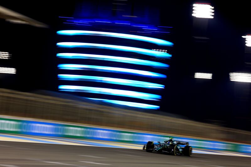 Fernando Alonso of Spain tests his Aston Martin. Getty
