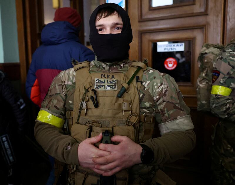 A foreign fighter from the UK prepares to depart to the front line in the east of Ukraine. Reuters