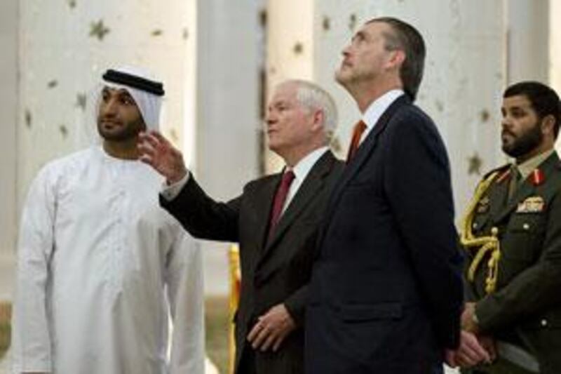 Robert Gates, the US defence secretary, second from left, at the Sheikh Zayed Grand Mosque in Abu Dhabi yesterday during a diplomatic visit to garner support for tougher sanctions against Iran.