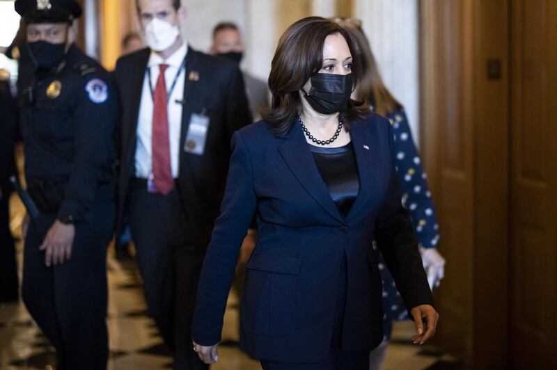 U.S. Vice President Kamala Harris, Democrat from California, wears a protective mask while walking through the U.S. Capitol in Washington, D.C., U.S. on Thursday, March 4, 2021. Senators enter the final stages of debating Democrats' $1.9 trillion pandemic relief bill today with passage in the chamber likely over the weekend and a security threat looming over the Capitol that prompted the House to wrap up work for the week ahead of schedule. Photographer: Ting Shen/Bloomberg