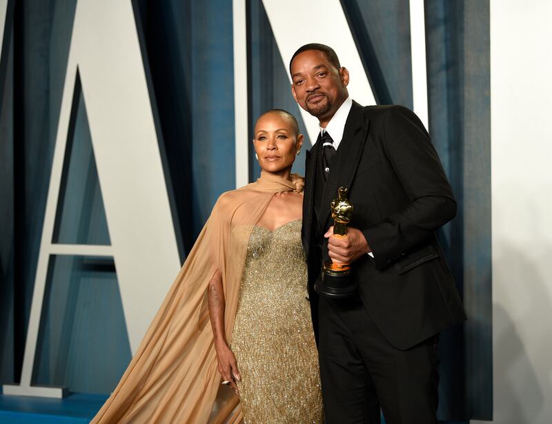 Jada Pinkett Smith with husband Will Smith, who was widely criticised for slapping Chris Rock at the Oscars ceremony in March. AP Photo