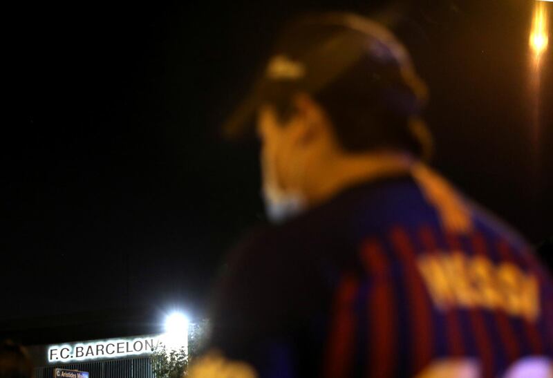Barcelona fans are seen outside the Camp Nou. Reuters