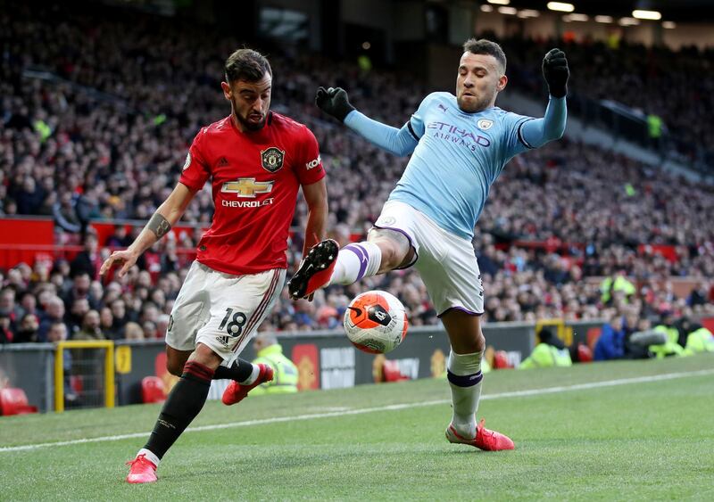 Manchester City's Nicolas Otamendi in action with Manchester United's Bruno Fernandes. Reuters