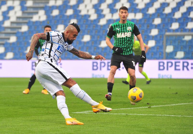 Inter Milan's Arturo Vidal fires in the shot that was turned into his own net by Vlad Chiriches of Sassuolo. Reuters