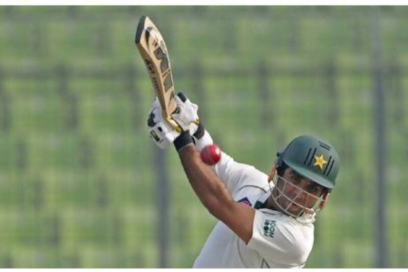 Pakistan's Taufeeq Umar plays a shot on his way to an unbeaten 44 against Bangladesh.