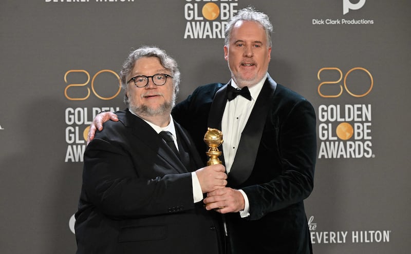Guillermo del Toro (L): Best Animated Feature for 'Pinocchio'. AFP