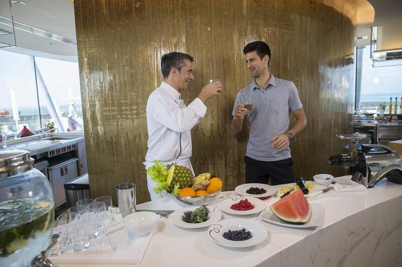 Novak Djokovic with chef Maxime Luvara at the Bab Al Yam restaurant at the Burj Al Arab in Dubai. Photo Courtesy / Dubai Duty Free Tennis Championships