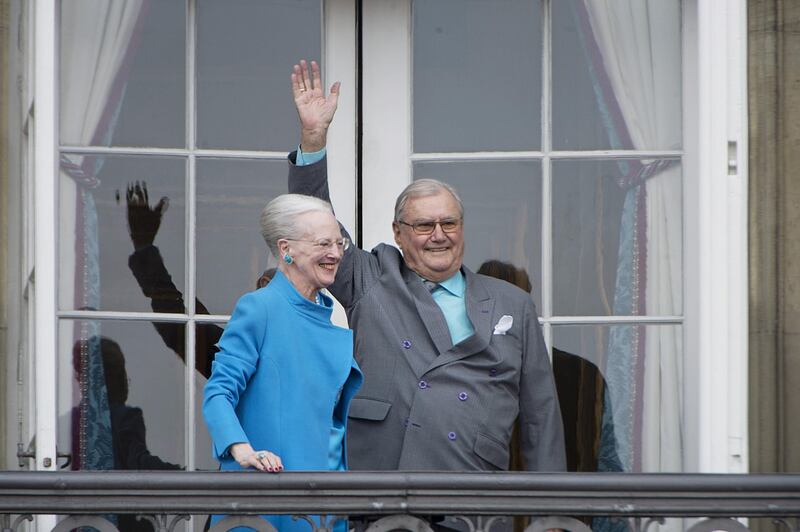 FILE PHOTO: Denmark's Queen Margrethe and Prince Henrik wave from the balcony during Queen Margrethe's 76th birthday celebration at Amalienborg Palace in Copenhagen, Denmark April 16, 2016. REUTERS/Marie Hald/Scanpix/File Photo  ATTENTION EDITORS - THIS IMAGE WAS PROVIDED BY A THIRD PARTY. FOR EDITORIAL USE ONLY. NOT FOR SALE FOR MARKETING OR ADVERTISING CAMPAIGNS. THIS PICTURE IS DISTRIBUTED EXACTLY AS RECEIVED BY REUTERS, AS A SERVICE TO CLIENTS. DENMARK OUT. NO COMMERCIAL OR EDITORIAL SALES IN DENMARK. NO COMMERCIAL SALES.