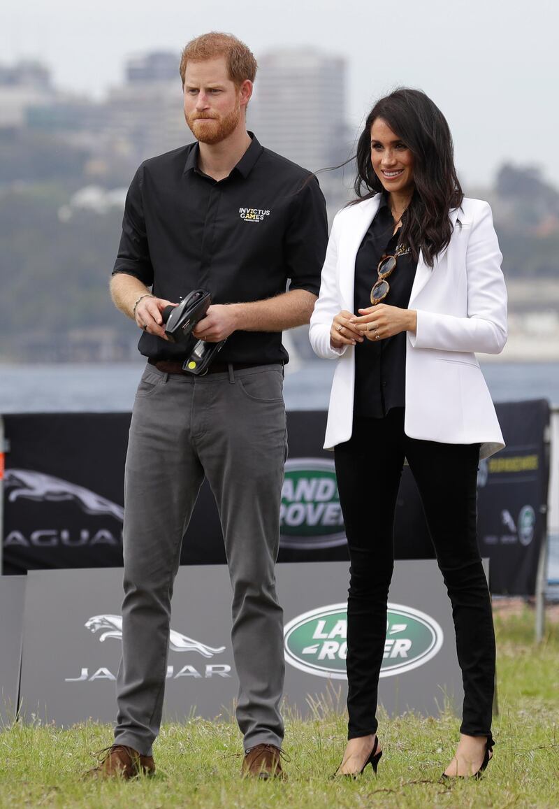 Meghan, Duchess of Sussex, wears an Altuzarra blazer, Mother jeans and Tabitha Simmons shoes at the Invictus Games in Sydney, Australia, on October 20, 2018. AP