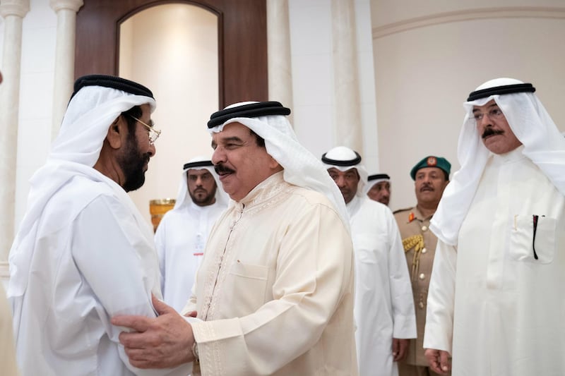 ABU DHABI, UNITED ARAB EMIRATES - November 20, 2019: HM King Hamad bin Isa Al Khalifa, King of Bahrain (C) offers condolences to HH Sheikh Tahnoon bin Mohamed Al Nahyan, Ruler's Representative in Al Ain Region (L), on the passing of the late HH Sheikh Sultan bin Zayed Al Nahyan, at Al Mushrif Palace. Seen with HE Mohammad Khalid Al Hamad Al Sabah Deputy Prime Minister and Minister of Interior of Kuwait (R).

( Mohamed Al Hammadi / Ministry of Presidential Affairs )
---