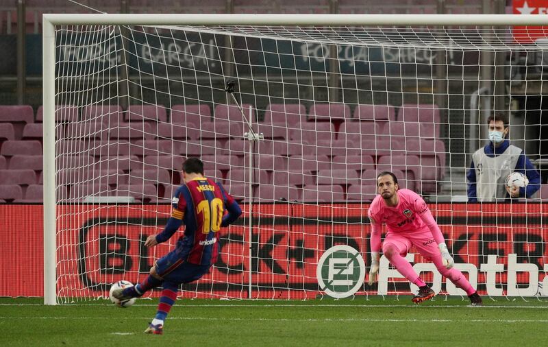 Lionel Messi misses a penalty against Valencia. Reuters