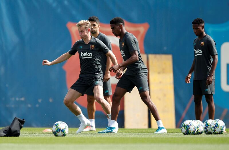 Barcelona's Frenkie de Jong, Luis Suarez, Junior Firpo and Anssumane Fati during training. Reuters