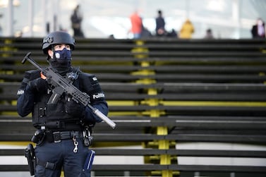 A police officer stands guard outside the court building in Antwerp, Belgium February 4, 2021. REUTERS/Johanna Geron