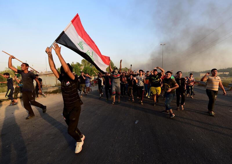 Iraqis protest in east Baghdad.  EPA