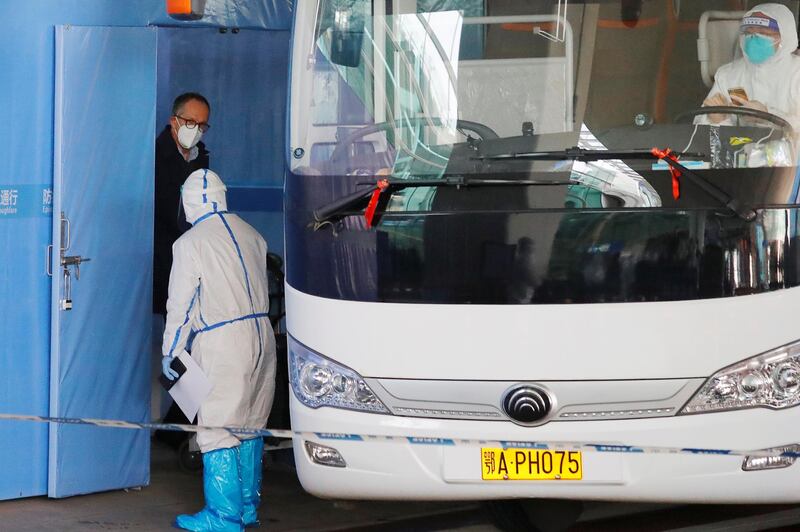 Peter Ben Embarek, a member of the WHO team, boards a bus before leaving Wuhan Tianhe International Airport in Wuhan, Hubei province, China. Reuters