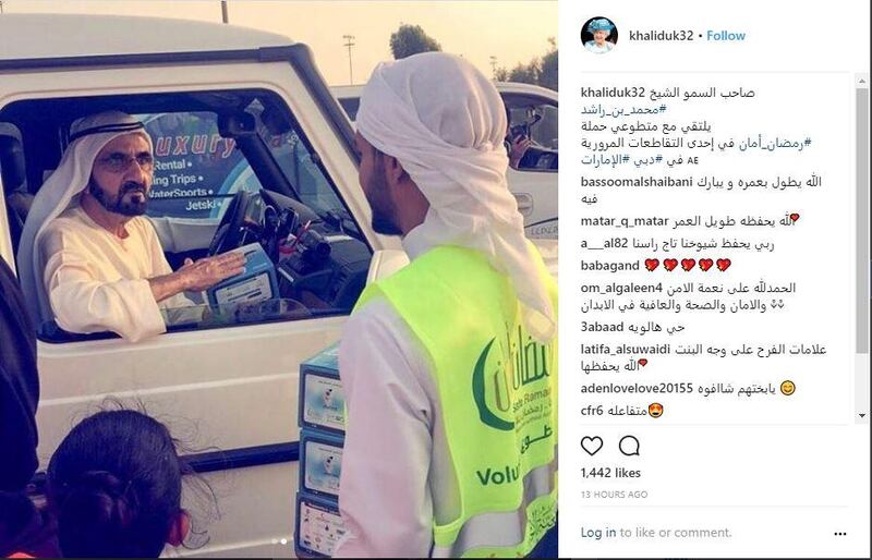 Sheikh Mohammed bin Rashid, Vice President and Ruler of Dubai, praises Al Ihsan Charity Association members for distributing meals on a busy road ahead of iftar. Courtesy khaliduk32 Instagram account