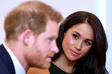 The Duke and Duchess of Sussex will step back as 'senior' royals and work to become financially independent. AP
