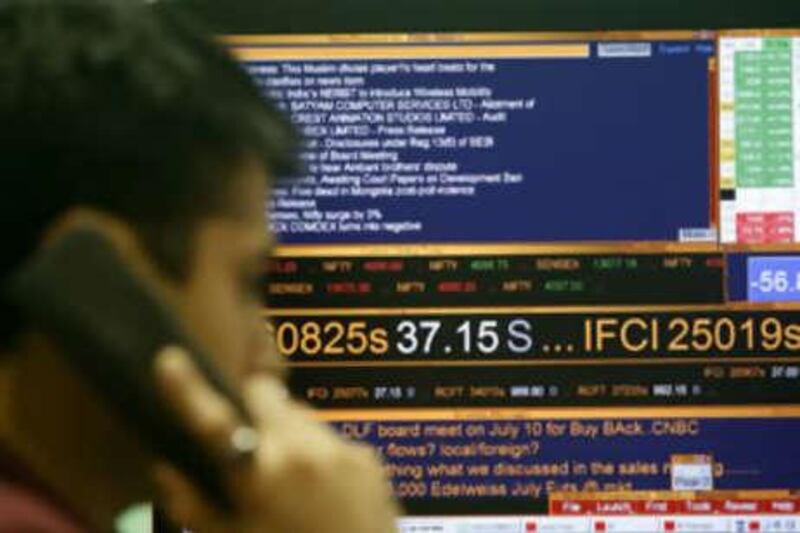 An Indian stock trader at work in a brokerage firm in Mumbai. Militants in India have turned to the stock market to raise funds.