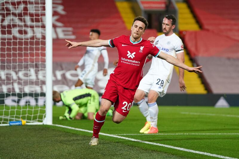 LIVERPOOL, ENGLAND - NOVEMBER 22: Diogo Jota of Liverpool scores their team's second goal during the Premier League match between Liverpool and Leicester City at Anfield on November 22, 2020 in Liverpool, England. Sporting stadiums around the UK remain under strict restrictions due to the Coronavirus Pandemic as Government social distancing laws prohibit fans inside venues resulting in games being played behind closed doors. (Photo by Jon Super - Pool/Getty Images)