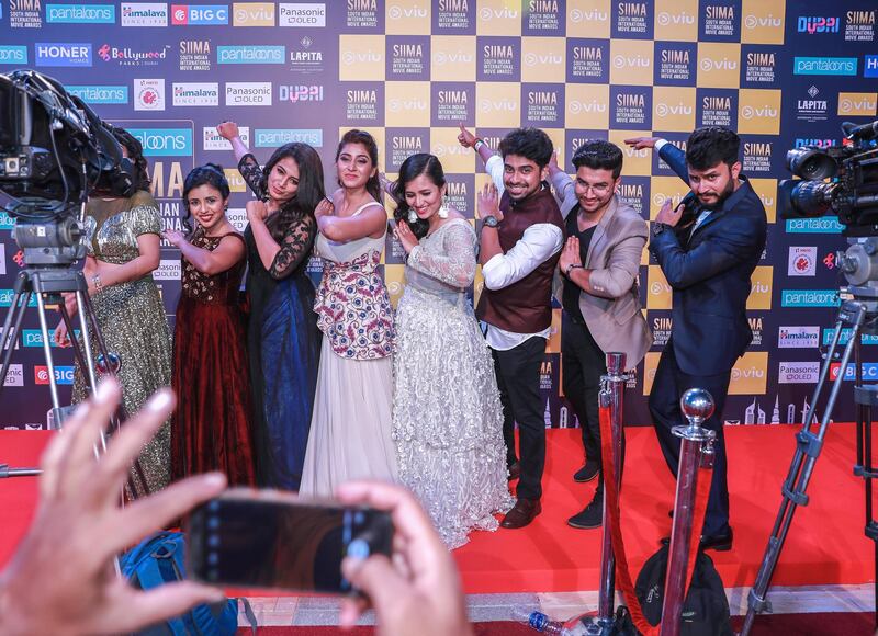 Dubai, United Arab Emirates, September 15, 2018.  SIIMA Day 2 Red Carpet. --- TV broadcasters strike a pose after the 2018 SIIMA red carpet event.Victor Besa/The NationalSection:  ACReporter:  Felicity Campbell
