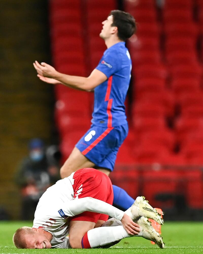 Kasper Dolberg – 7: Had early chances; denied by Coady tackle once then had shot deflected into side netting by Phillips. Limped off in first half after challenge by Maguire that resulted in England man’s red card. Shame, as he had looked lively. AP