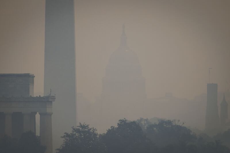 The US Capitol shrouded in smoke. Bloomberg