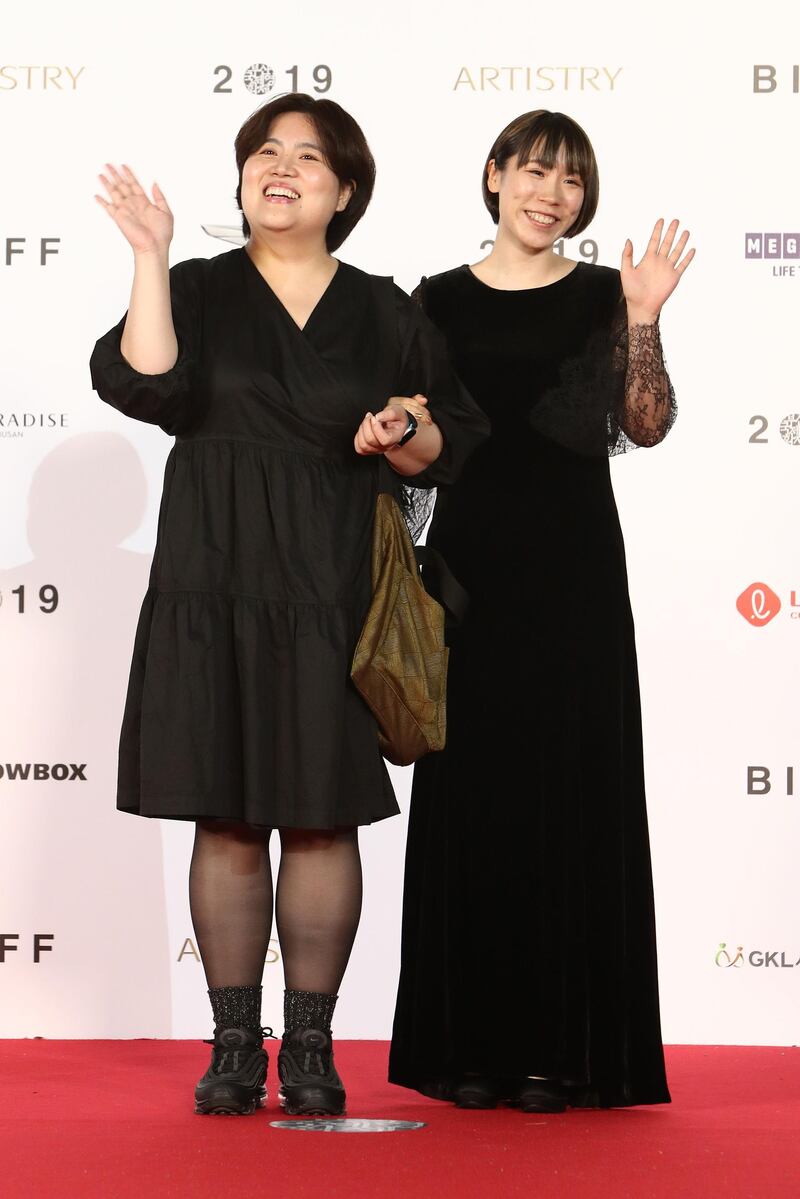 Producer Moon Hye-sun director Sae Suzuki arrive for the Opening Ceremony of the 24th Busan International Film Festival. Getty Images