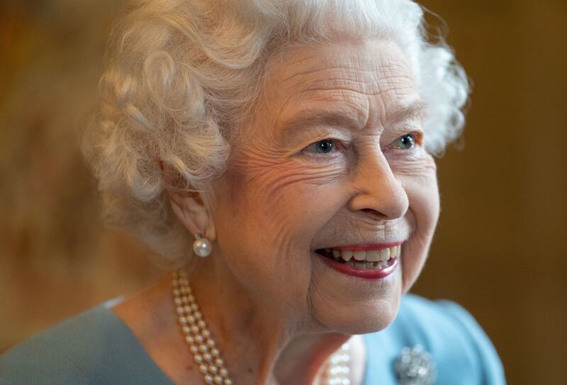 Britain's Queen Elizabeth attending a reception at Sandringham House this month, before she tested positive for Covid-19. AFP