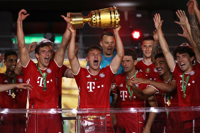 Joshua Kimmich  lifts the winners' trophy. EPA