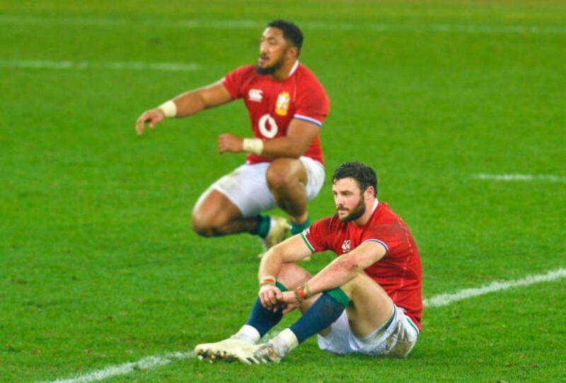 Robbie Henshaw, right, and Bundee Aki of British and Irish Lions dejected after the third Test against South Africa.