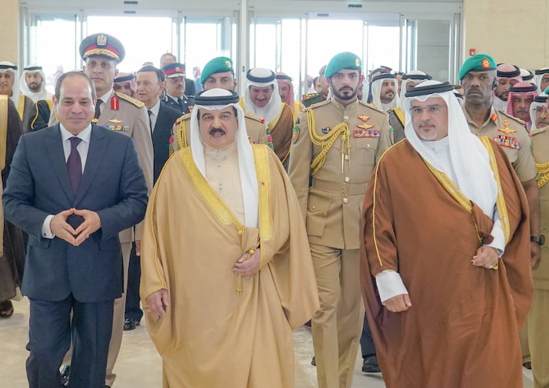 King Hamad, Bahrain's Crown Prince and Prime Minister Salman bin Hamad and Mr El Sisi at the airport in Muharraq. Reuters
