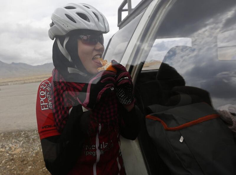 Masooma Alizada, a member of Afghanistan’s Women’s National Cycling Team eats an orange after training. Mohammad Ismail / Reuters