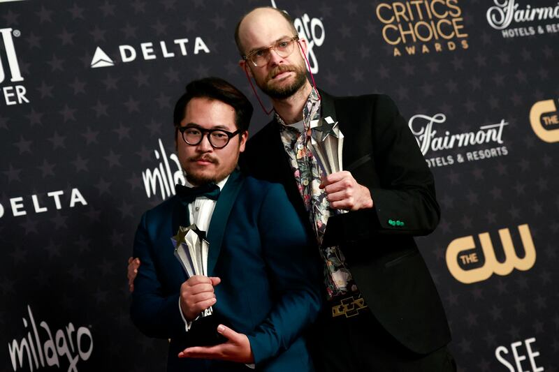 Directors Daniel Kwan, left, and Daniel Scheinert won the award for Best Original Screenplay for Everything Everywhere All at Once. AFP
