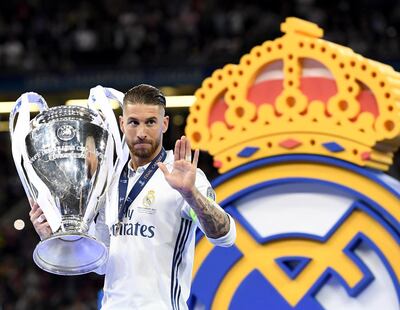 epa09278832 (FILE) - Real Madrid's Sergio Ramos receives the trophy after winning the UEFA Champions League final between Juventus FC and Real Madrid at the National Stadium of Wales in Cardiff, Britain, 03 June 2017 (reissued 17 June 2021). Real Madrid's icon Sergio Ramos will leave the club after his contract expires on 30 June 2021. The club announced to bid Ramos farewell on 17 June 2021 in a virtually held press conference.  EPA/ANDY RAIN *** Local Caption *** 53565189