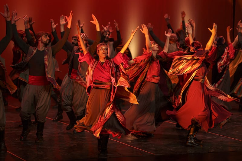 Members of the Funoun Palestinian Popular Dance Troupe perform during the Palestine International Festival for Music and Dance (PIF) in the city of Ramallah in the occupied West Bank on June 30, 2022.  (Photo by ABBAS MOMANI  /  AFP)