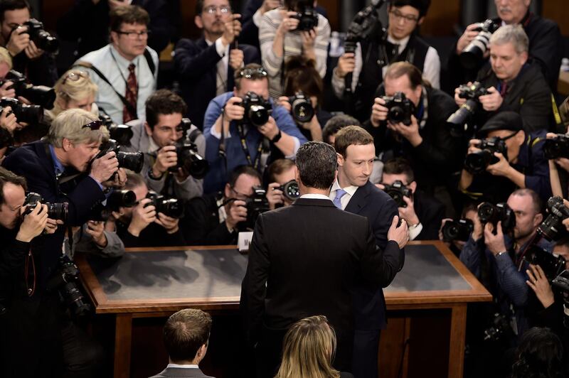 TOPSHOT - Facebook CEO Mark Zuckerberg arrives to testify before a joint hearing of the US Senate Commerce, Science and Transportation Committee and Senate Judiciary Committee on Capitol Hill, April 10, 2018 in Washington, DC.
Zuckerberg, making his first formal appearance at a Congressional hearing, seeks to allay widespread fears ignited by the leaking of private data on tens of millions of users to British firm Cambridge Analytica working on Donald Trump's 2016 presidential campaign. / AFP PHOTO / Brendan Smialowski