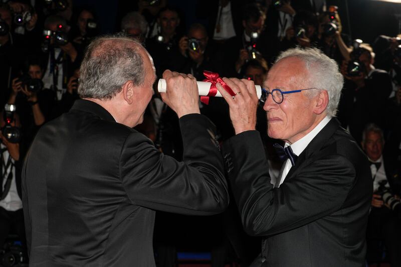 Directors Luc Dardenne, left, and Jean-Pierre Dardenne, winners of the 75th Prize for 'Tori and Lokita'. AP