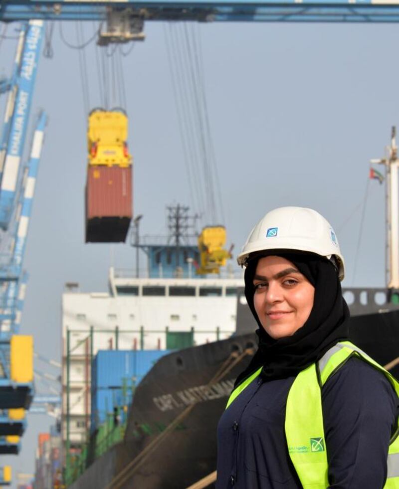 Ayesha Al Marzooqi operates a 126-metre crane moving containers from large ships to shore and found out about the job during an open day event last year to recruit UAE nationals. Courtesy Tawdheef