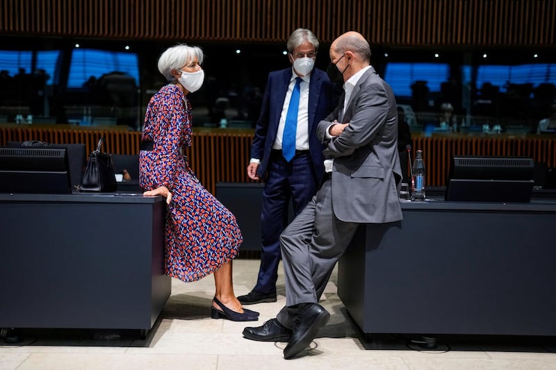 European Central Bank President Christine Lagarde talks to European Commissioner for Economy Paolo Gentiloni, and German Finance Minister Olaf Scholz, during a meeting of Eurogroup Finance Ministers at the European Council building in Luxembourg, Luxembourg June 17, 2021. Francisco Seco/Pool via REUTERS