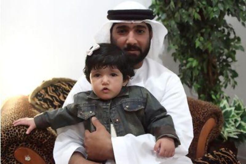 5 - February -2013, Al Moror, Abu Dhabi

Shaima with her Father Khalid in the photo

Emirati girl, Shaima, who was diagnosed with congenital heart disease at two weeks old. After a failed surgical attempt to correct her heart that did her more harm then good, Shaima's parents decided to take her straight to the US for treatment. Fatima AL Marzooqi/The National.