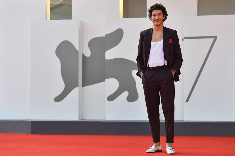 Austrian actor Noah Saavedra arrives for the screening of 'Und Morgen Die Ganze Welt' at the 77th Venice Film Festival on September 10, 2020. AFP