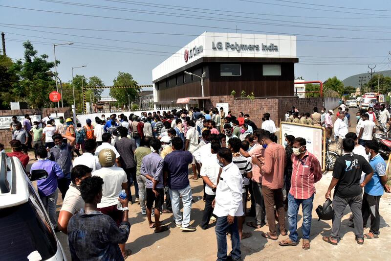 A crowd gathers outside the LG Polymers plant from where gas leaked in Visakhapatnam, India. AP Photo