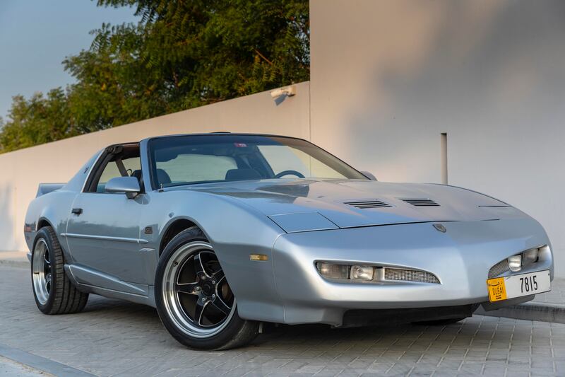 The Trans Am stands out for its T-top roof, streamlined nose cone and silver paint job 