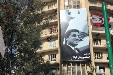 A huge banner of Lebanon’s late president elect Bachir Gemayel, father of Nadim Gemayel, stands in Beirut’s Sassine Square. He was assassinated in September 1982. Arthur MacMillan / The National