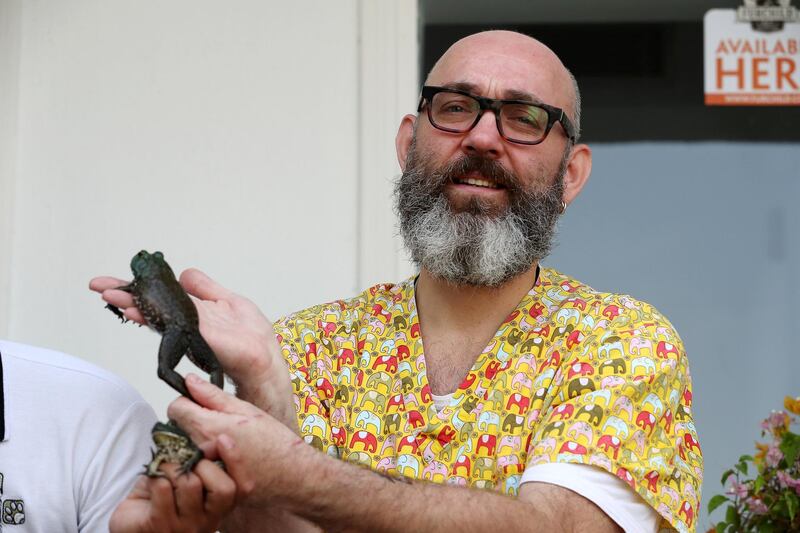 DUBAI ,  UNITED ARAB EMIRATES , May 14 – 2019 :- Dr. Piotr Jaworski , Senior Vet showing the Bull Frog at the Advanced Pet Care Clinic on Al Wasl road in Dubai. This Bull Frog eat dead rats. ( Pawan Singh / The National ) For News. Story by Nick Webster